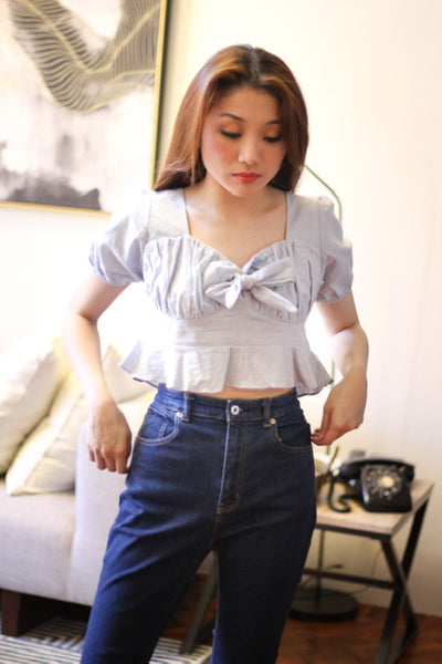 Light blue top with ribbon