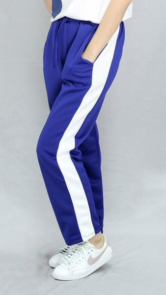 Royal blue track pants with white strip